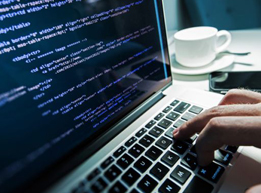 computer-programmer-coding-on-laptop